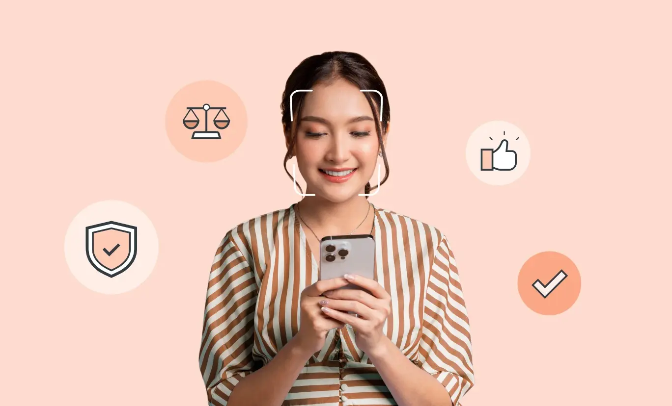An image of a girl looking at her smartphone. Surrounding her are illustrative icons such as a shield which represents privacy and a set of scales representing fairness.