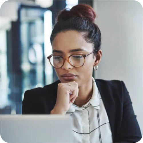 Woman paying close attention to her computer screen