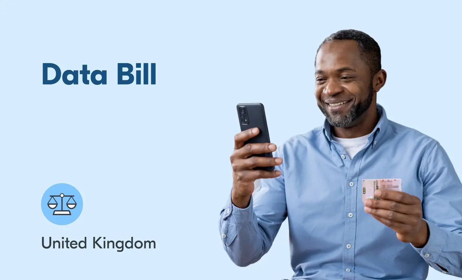 Image of a man holding his mobile phone in one hand and a driving licence in the other hand. The accompanying text reads "Data Bill - United Kingdom".